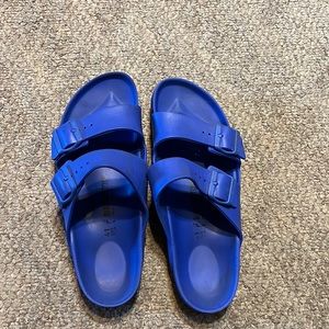 Blue Birkenstock Sandals wore only a few times no damage done at all.